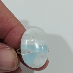 Blue and white hand crafted glass oval sparkle ring. Silver plated adjustable